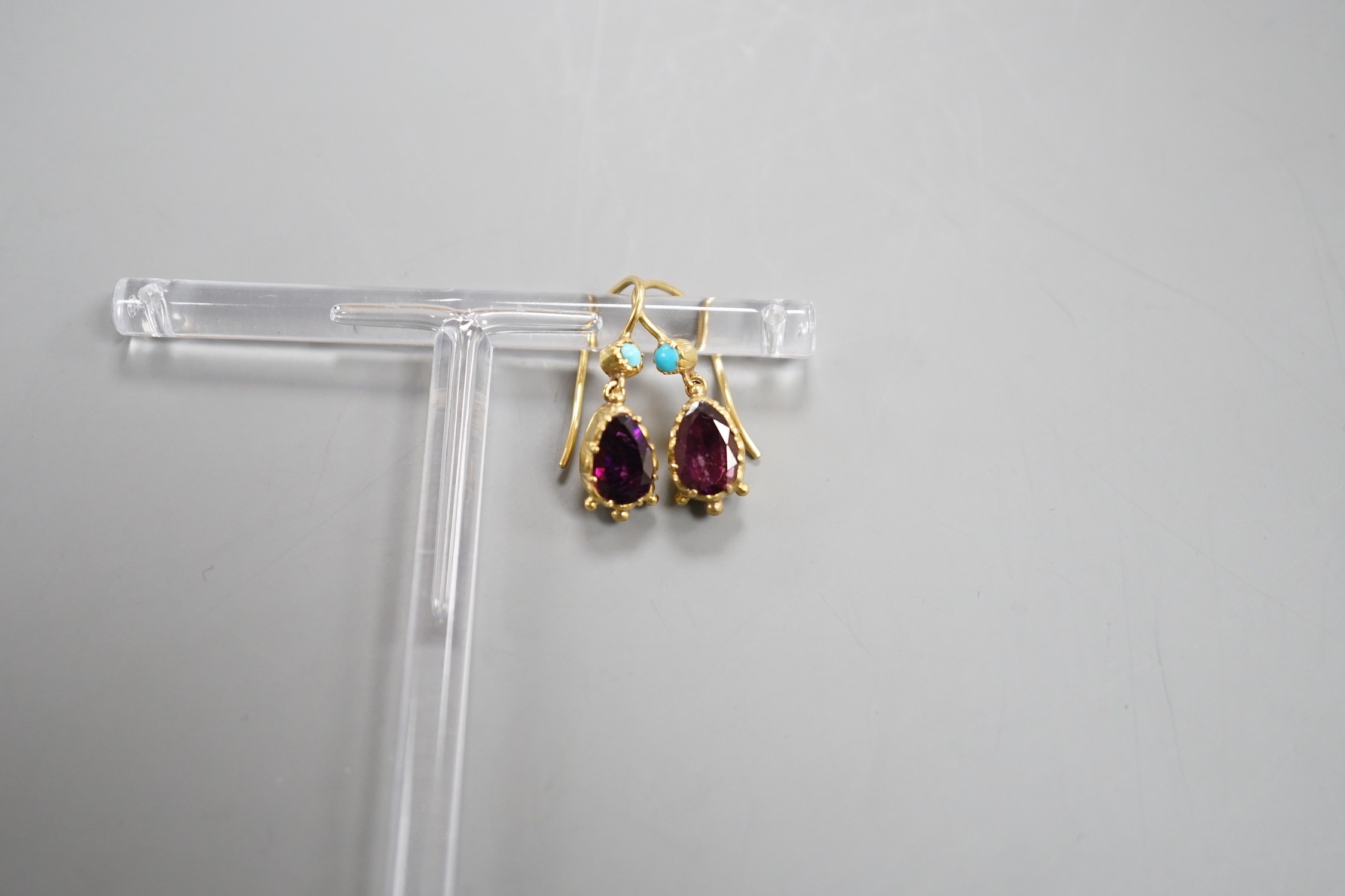 A pair of early 20th century yellow metal, garnet and turquoise set drop earrings, 16mm, gross weight 2.7 grams.